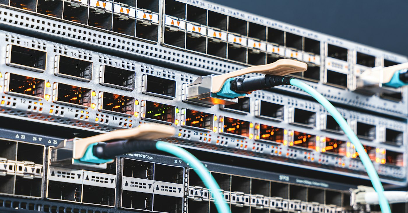 Precisely organized network cables running into server ports